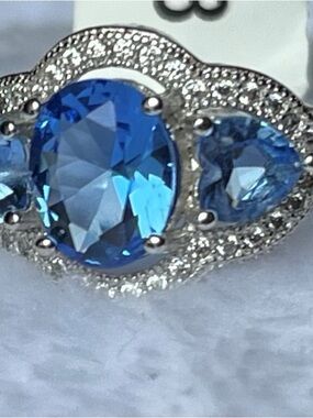 Charmed Aroma Blue Crystal Triple-Stone Halo Ring